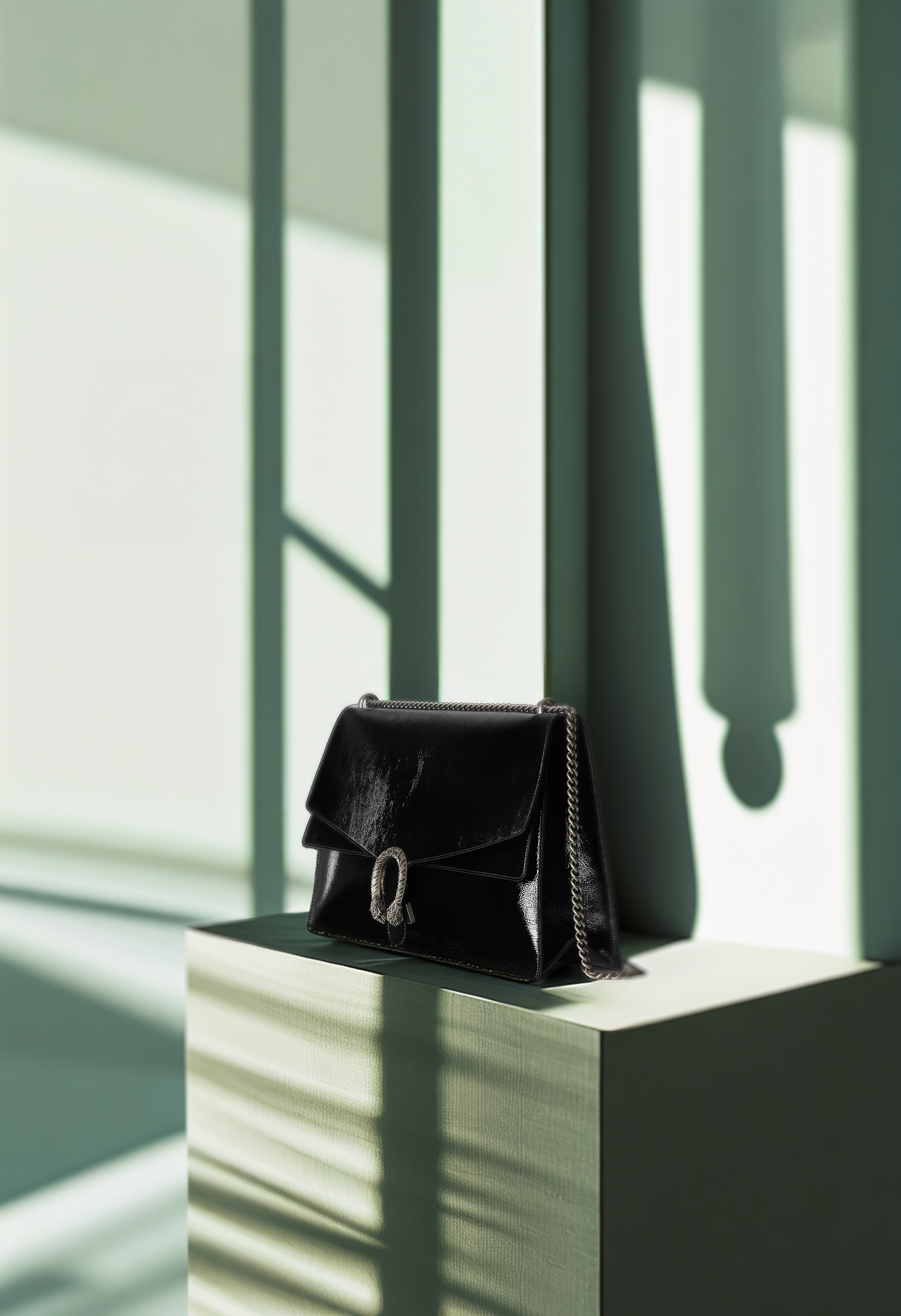 Expert authenticating a luxury handbag